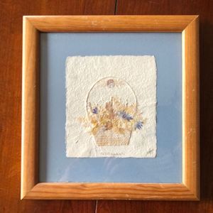 “Wildflowers” 10 1/2 by 11 1/4 framed natural tone wood/ blue mat/ signed